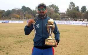 Nepal's coach Rijan Prazoo with the trophy